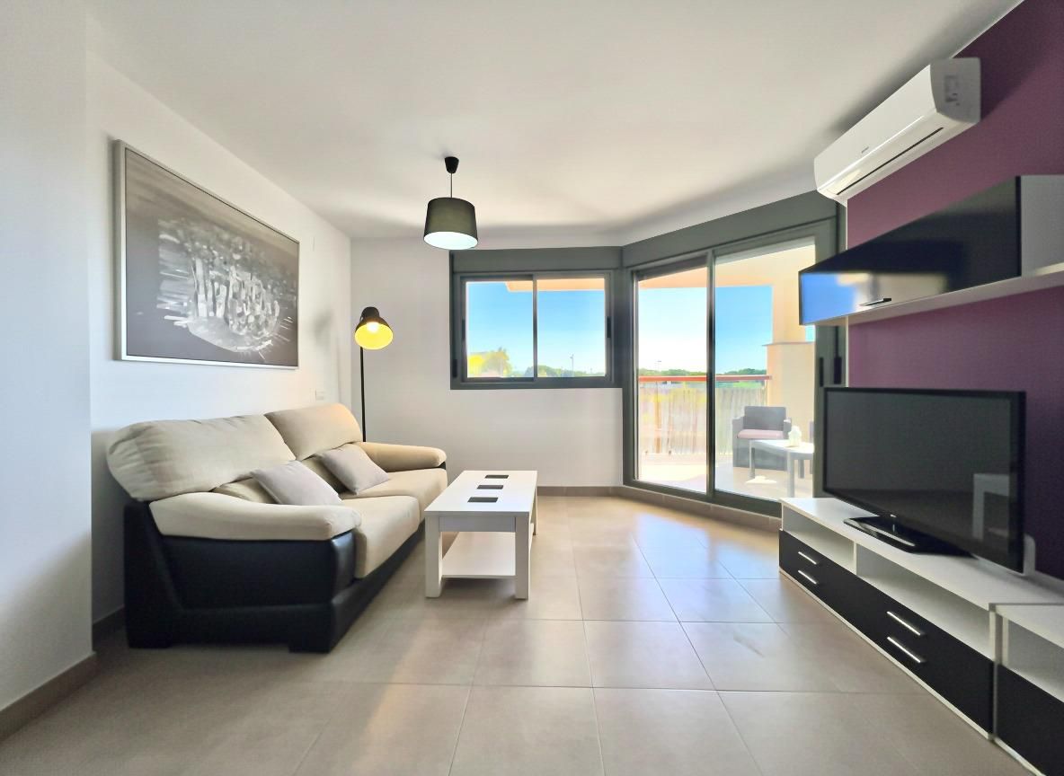Living room of Flat for sale in  Almería Capital  with Air Conditioner, Heating and Private garden
