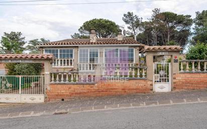 Vista exterior de Casa o xalet en venda en Caldes de Malavella amb Aire condicionat, Calefacció i Jardí privat