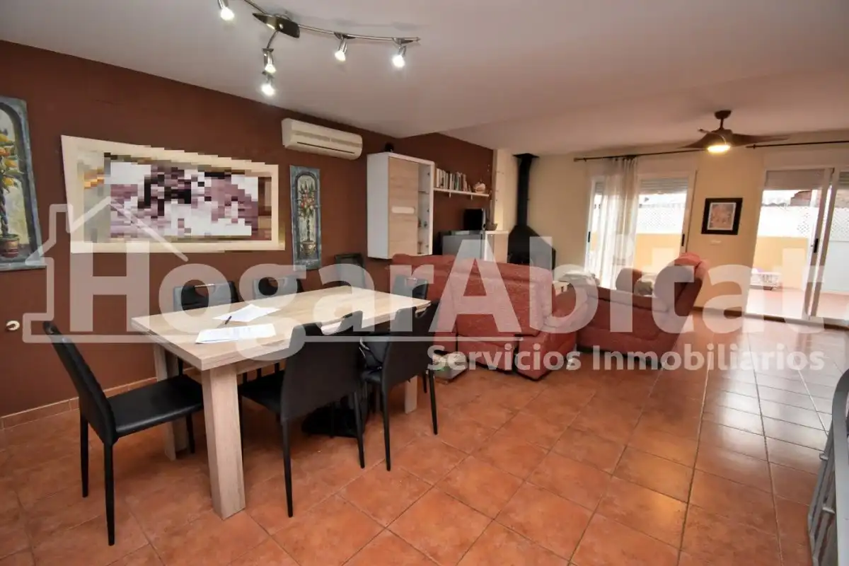 Sala d'estar de Casa adosada en venda en Burriana / Borriana amb Jardí privat, Terrassa i Piscina comunitària