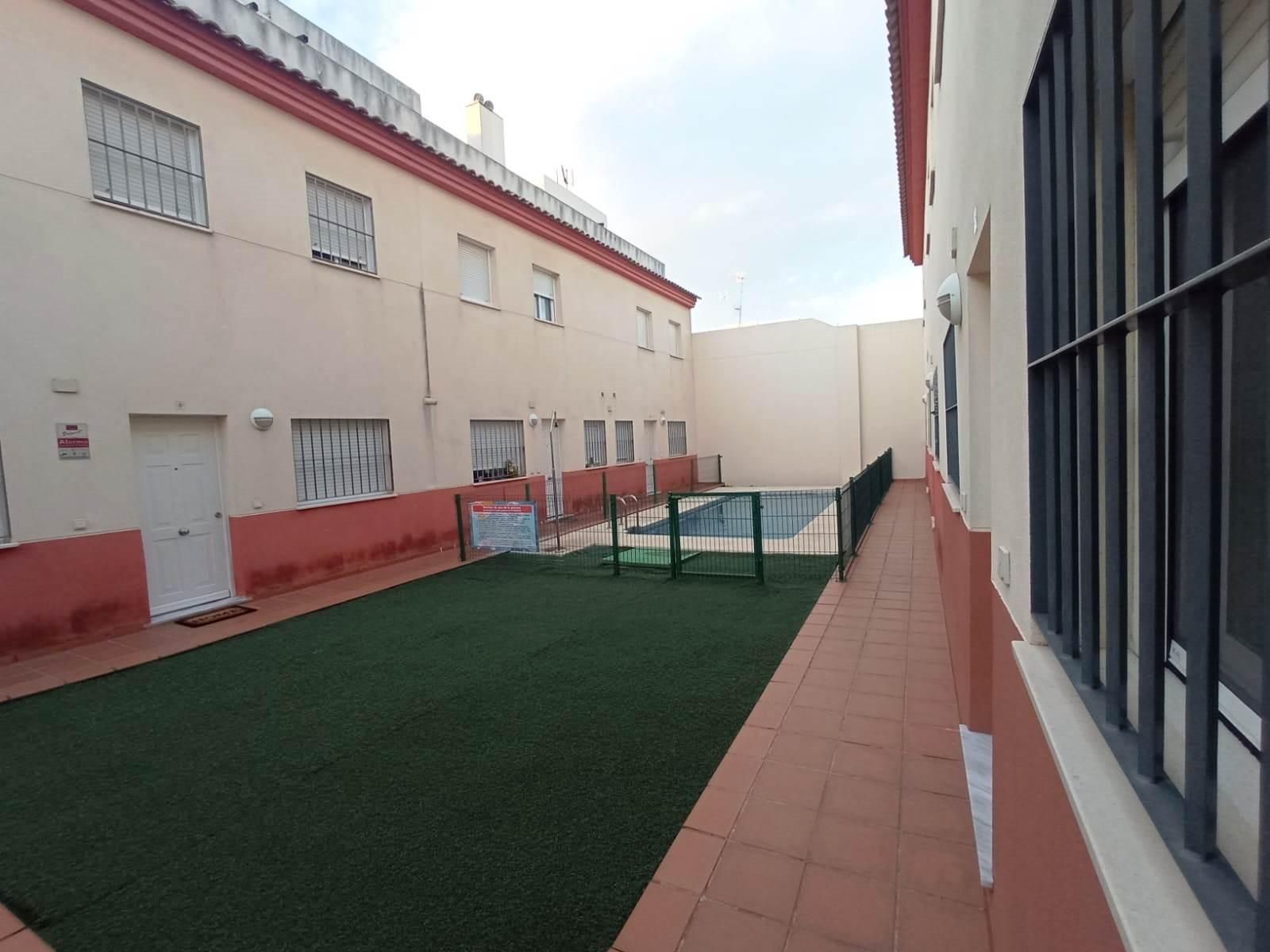 Exterior view of Single-family semi-detached for sale in Brenes  with Terrace and Community pool