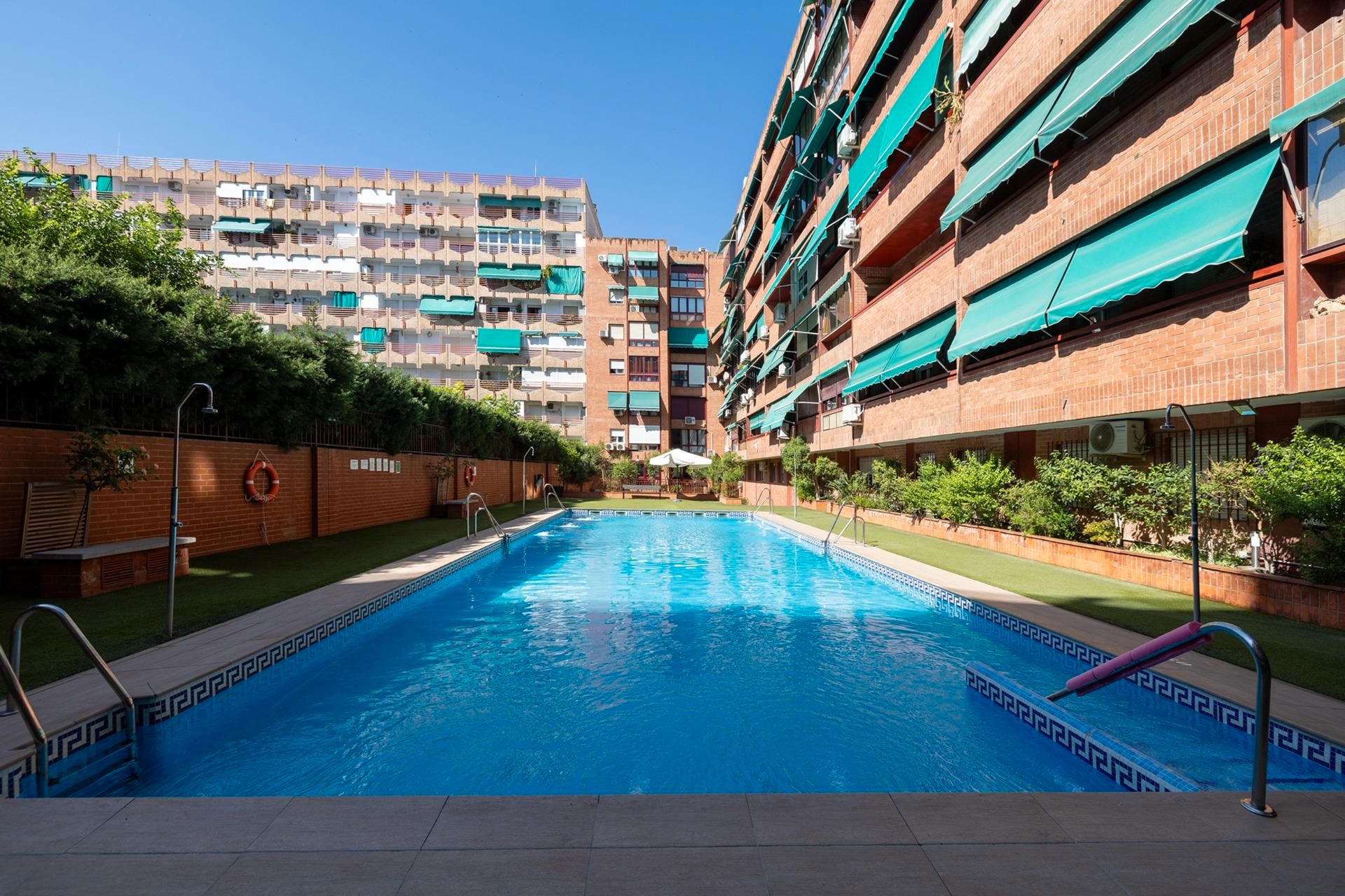 Swimming pool of Flat for sale in  Granada Capital  with Heating, Parquet flooring and Community pool