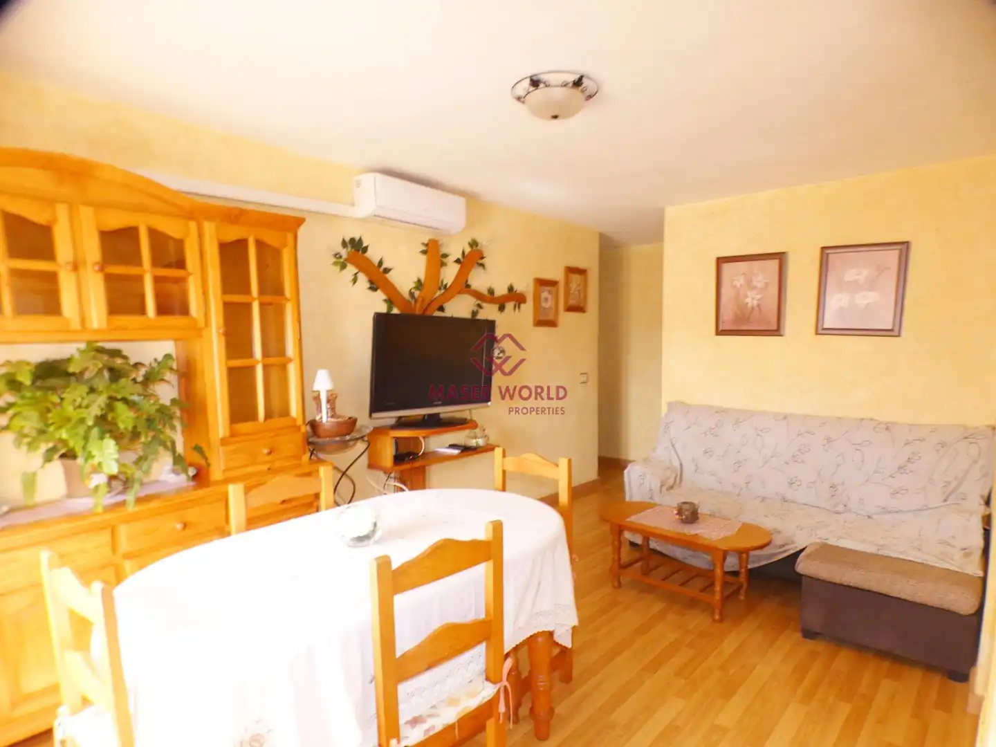 Sala de estar de Apartamento en venta en Mazarrón con Aire acondicionado, Parquet y Amueblado