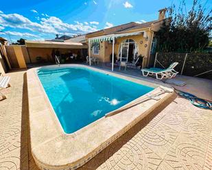 Swimming pool of House or chalet for sale in Torrevieja  with Air Conditioner, Heating and Terrace