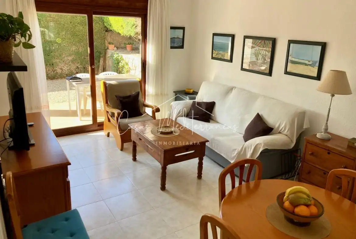 Sala de estar de Casa adosada de alquiler en Vandellòs i l'Hospitalet de l'Infant con Jardín privado, Terraza y Amueblado