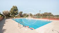 Swimming pool of Duplex for sale in  Madrid Capital  with Air Conditioner, Heating and Private garden