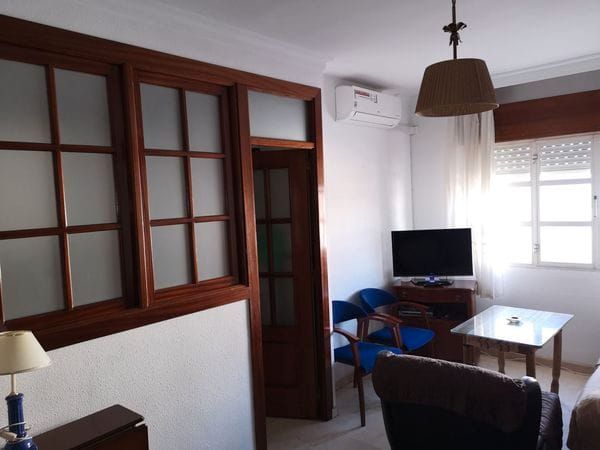 Menjador de Apartament de lloguer en Dos Hermanas amb Aire condicionat i Moblat