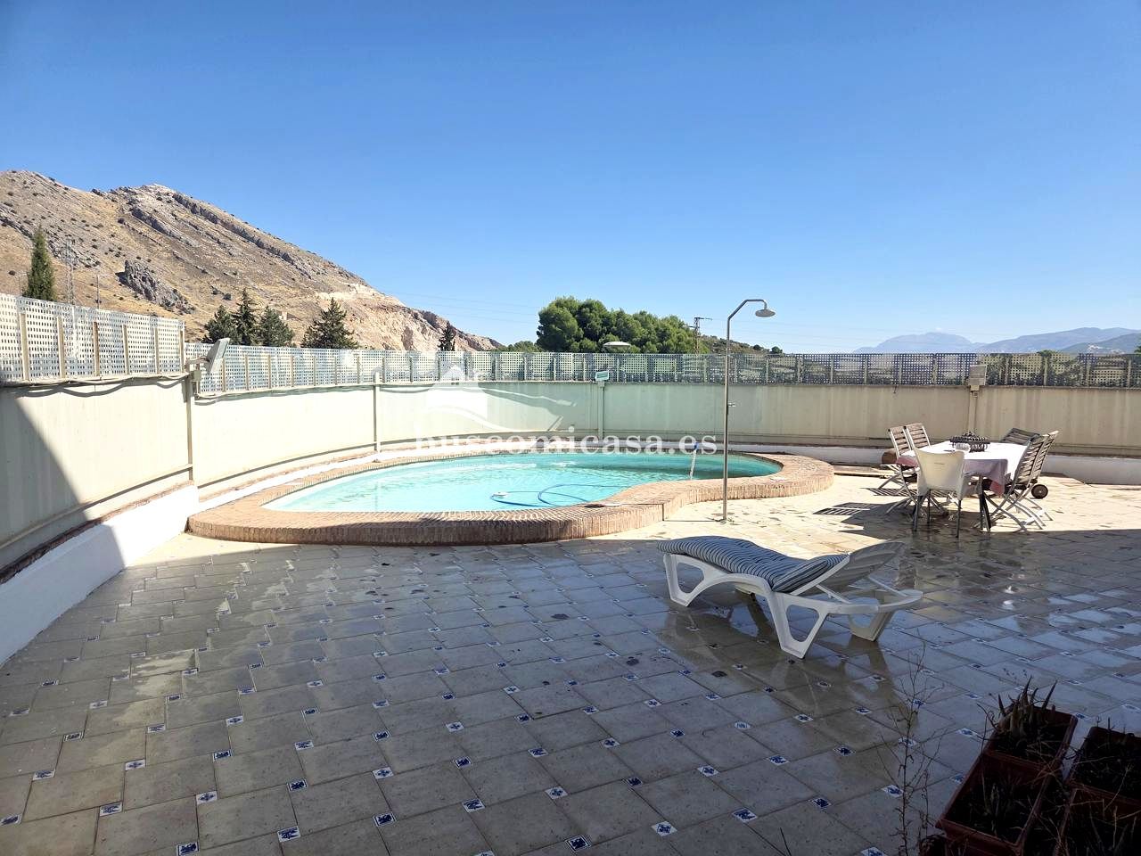 Swimming pool of Single-family semi-detached for sale in  Jaén Capital  with Air Conditioner, Heating and Terrace