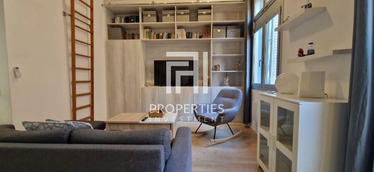 Sala de estar de Dúplex en venta en  Barcelona Capital con Aire acondicionado, Calefacción y Parquet