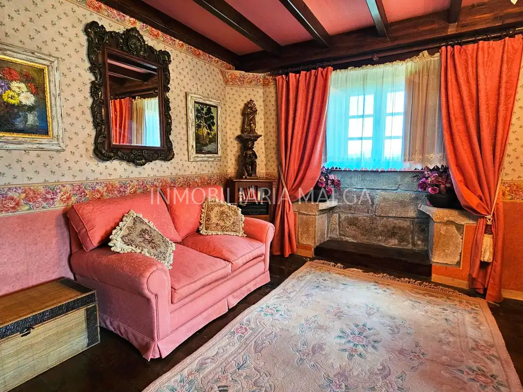Sala d'estar de Casa o xalet en venda en Villaviciosa amb Calefacció, Jardí privat i Parquet