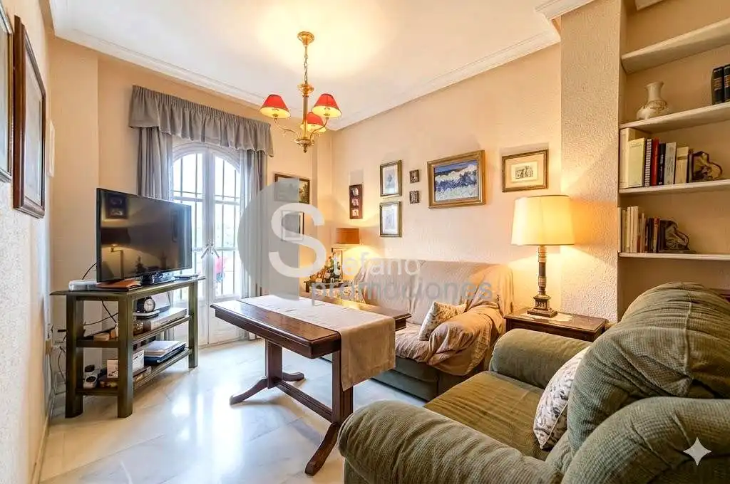 Sala d'estar de Casa adosada en venda en Málaga amb Aire condicionat, Terrassa i Traster