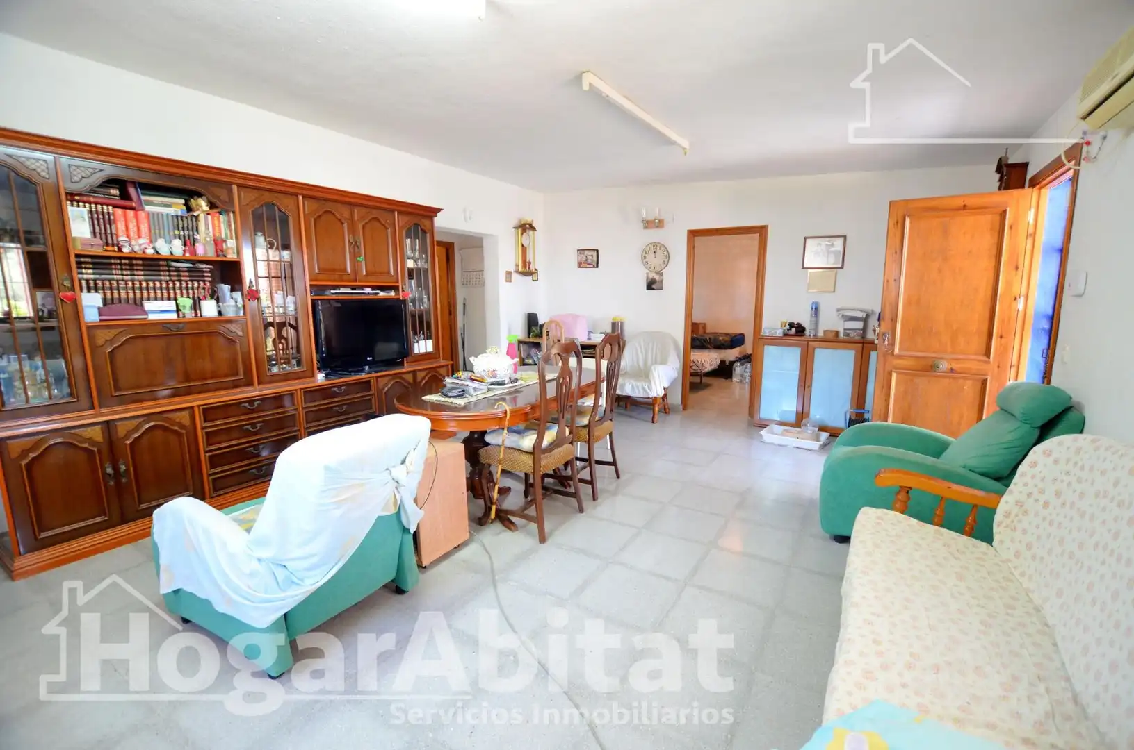 Sala d'estar de Casa o xalet en venda en Alicante / Alacant amb Aire condicionat, Calefacció i Jardí privat