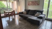 Living room of Flat for sale in Sabadell  with Air Conditioner, Parquet flooring and Balcony