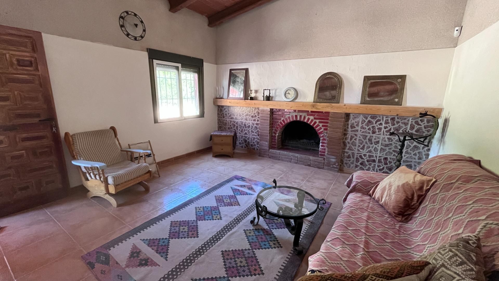 Sala d'estar de Casa o xalet en venda en Tobarra amb Jardí privat, Terrassa i Traster