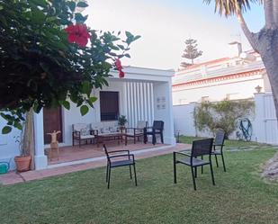 Jardí de Casa adosada de lloguer en Benalmádena amb Aire condicionat i Terrassa