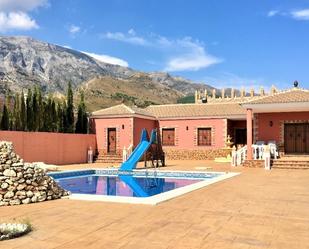 Vista exterior de Finca rústica en venda en Sedella amb Calefacció, Terrassa i Piscina