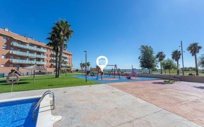Swimming pool of Planta baja for sale in Cubelles  with Air Conditioner, Heating and Private garden