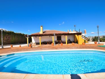 Casa rústica amb piscina en venda a Partidas Norte