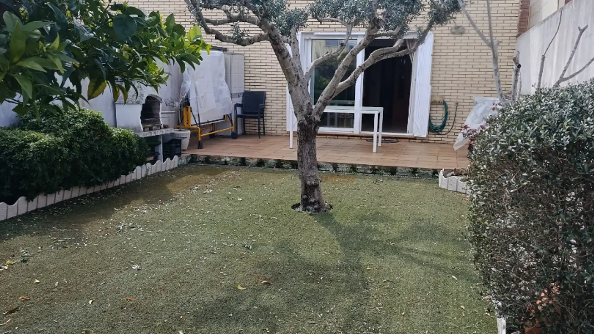 Terrasse von Einfamilien-Reihenhaus zum Verkauf in El Morell mit Heizung, Privatgarten und Ofen