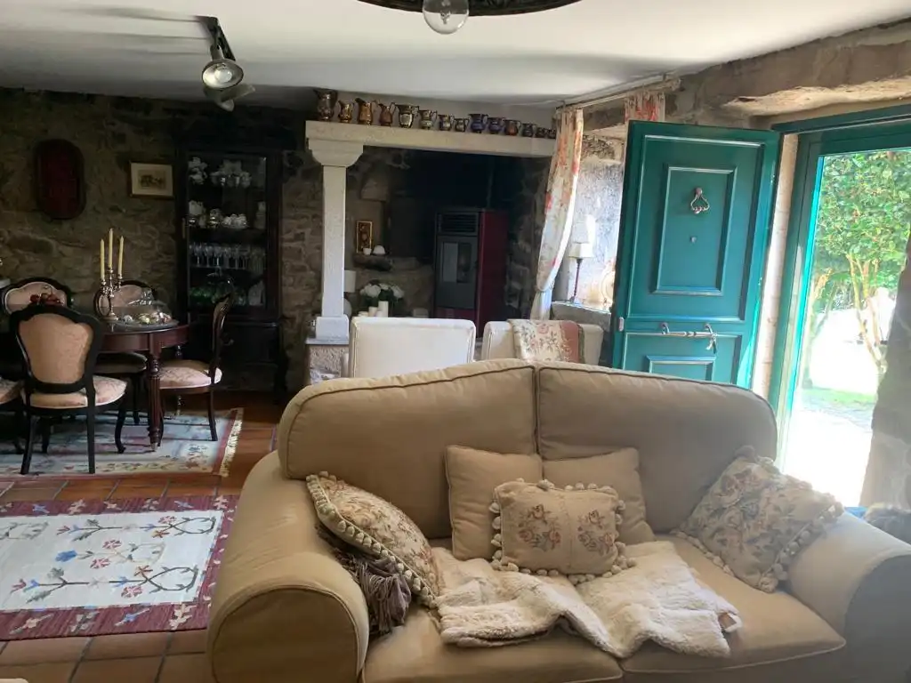 Sala de estar de Casa adosada en venta en Brión con Calefacción, Jardín privado y Terraza