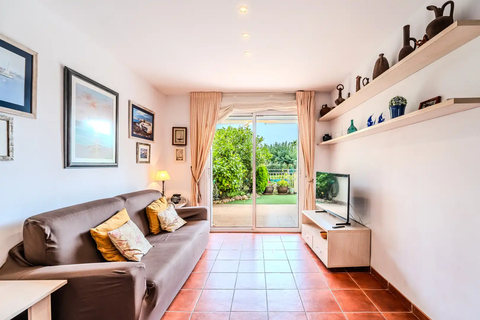 Sala de estar de Piso en venta en L'Ampolla con Aire acondicionado, Calefacción y Terraza