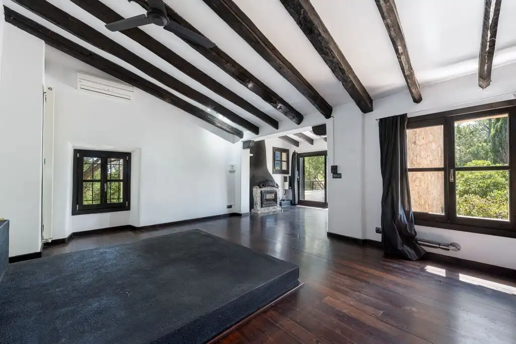 Sala de estar de Finca rústica en venta en Pollença con Aire acondicionado