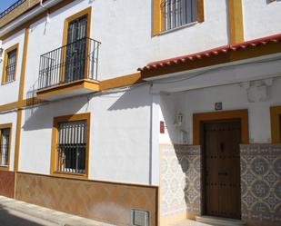 Exterior view of Single-family semi-detached for sale in Carrión de los Céspedes  with Air Conditioner, Terrace and Storage room