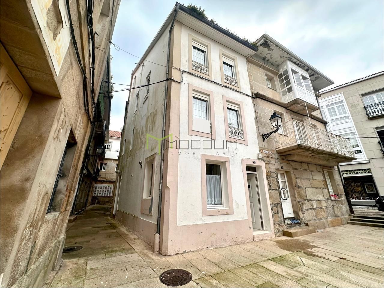 Vista exterior de Casa o xalet en venda en Muros amb Traster i Moblat