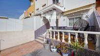 Exterior view of Single-family semi-detached for sale in Torrevieja  with Air Conditioner, Terrace and Furnished
