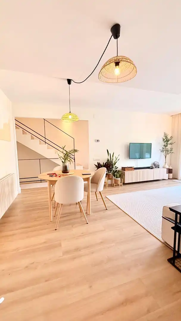 Sala d'estar de Casa adosada en venda en Cunit amb Aire condicionat, Calefacció i Jardí privat