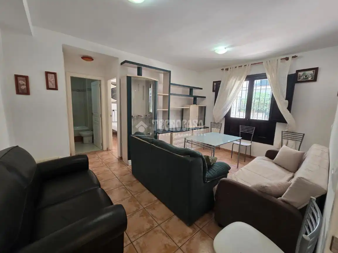 Sala de estar de Piso en venta en Vélez de Benaudalla con Aire acondicionado, Terraza y Piscina comunitaria
