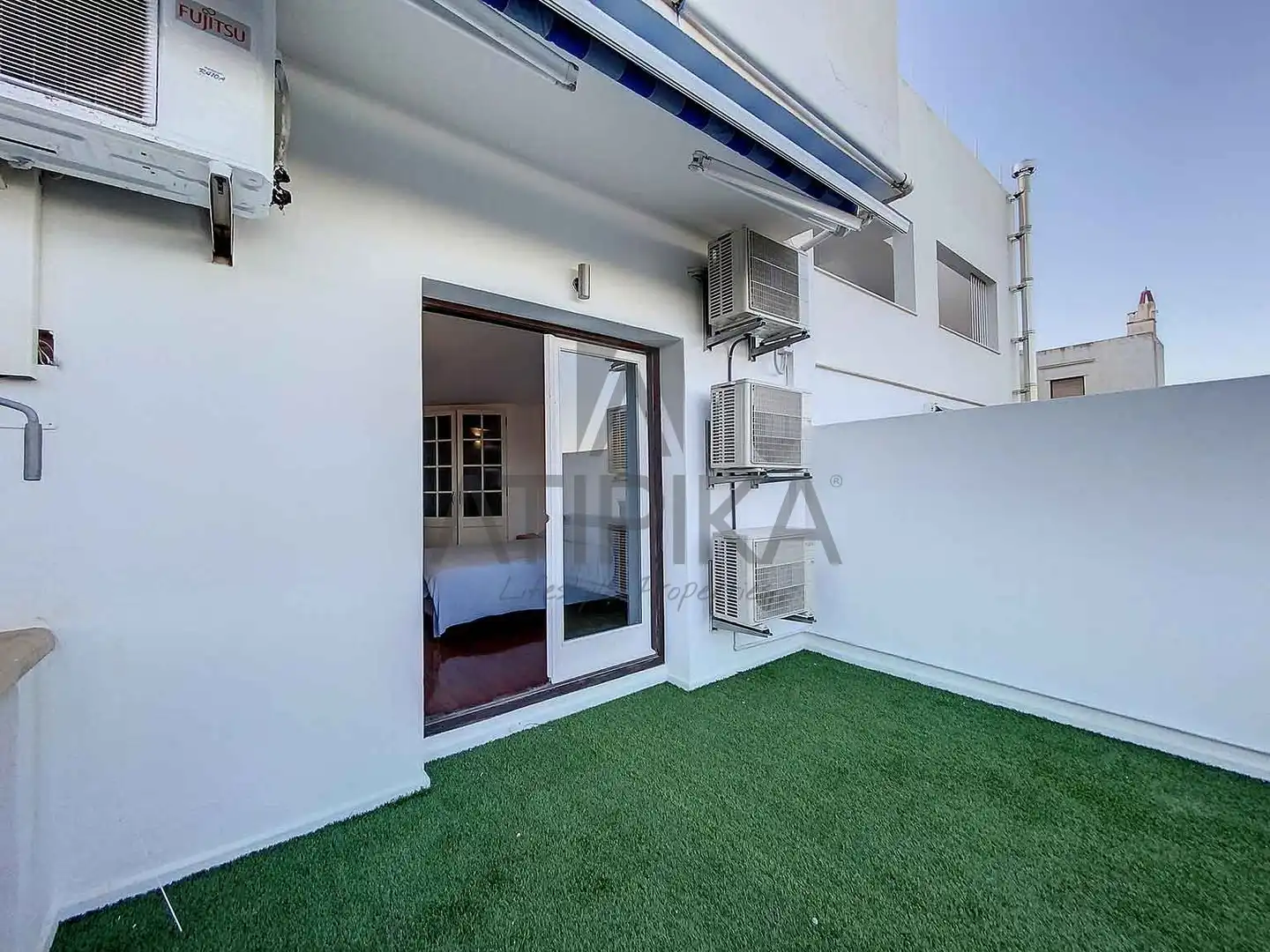 Außenansicht von Wohnung zum Verkauf in Sant Lluís mit Klimaanlage, Terrasse und Möbliert