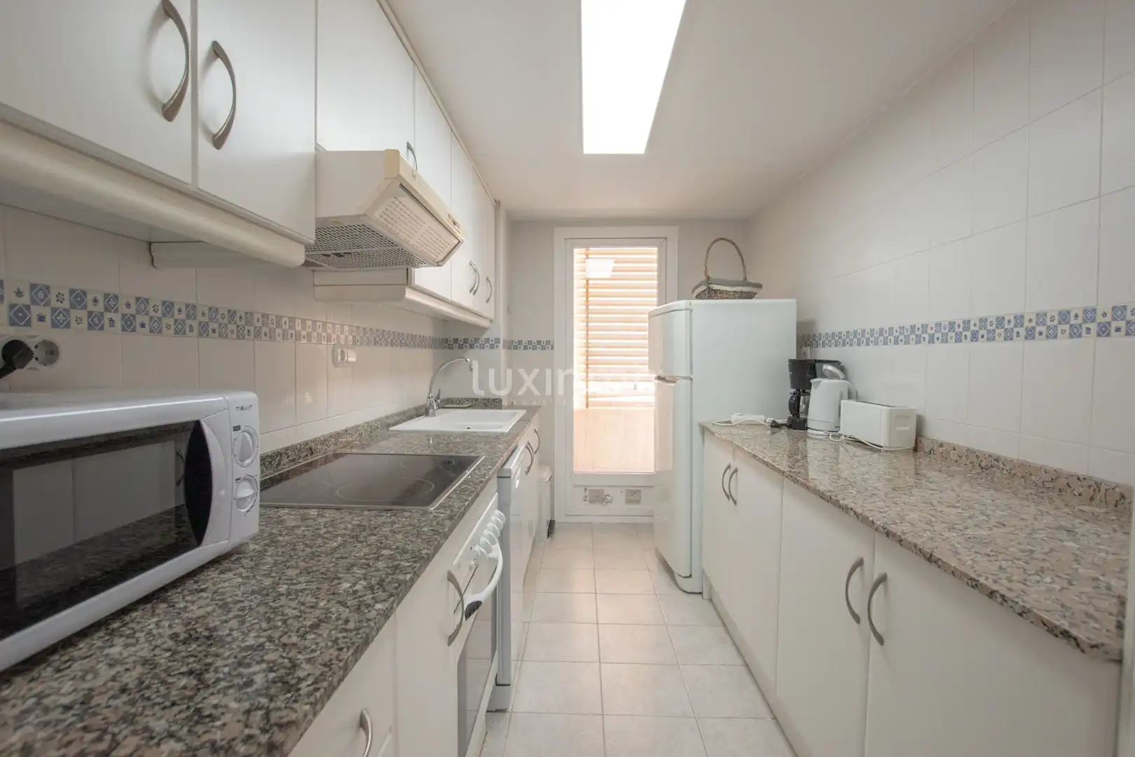 Kitchen of Flat for sale in Calpe / Calp  with Air Conditioner, Private garden and Terrace
