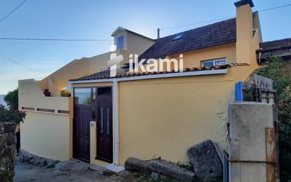 Vista exterior de Casa o xalet en venda en Sanxenxo amb Terrassa i Moblat