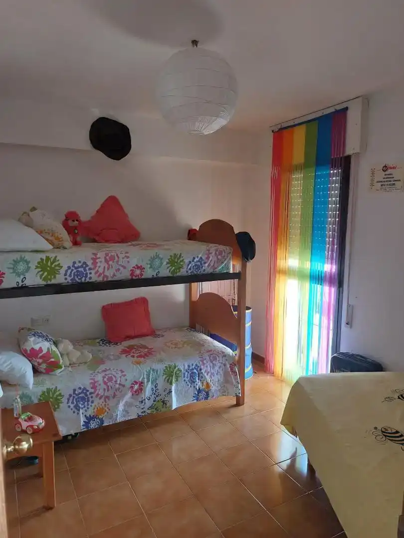 Dormitori de Casa adosada de lloguer en Conil de la Frontera amb Balcó