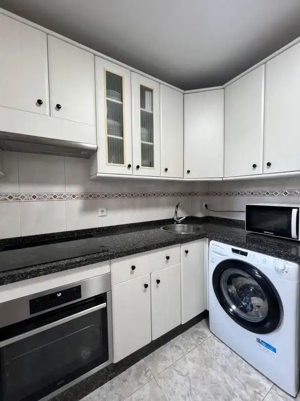 Kitchen of Flat for rent in Gijón   with Heating and Terrace