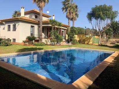 Exterior view of House or chalet for sale in Mairena del Alcor  with Air Conditioner, Heating and Private garden