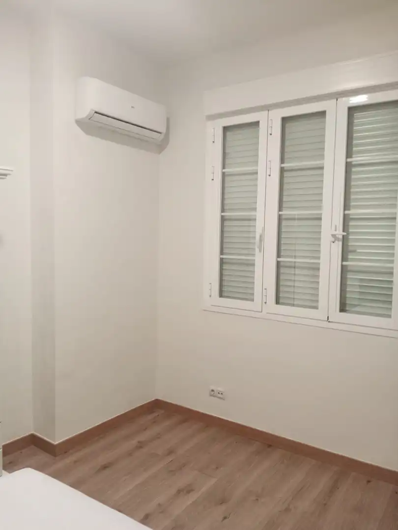 Habitación de Apartamento de alquiler en Málaga con Aire acondicionado y Amueblado