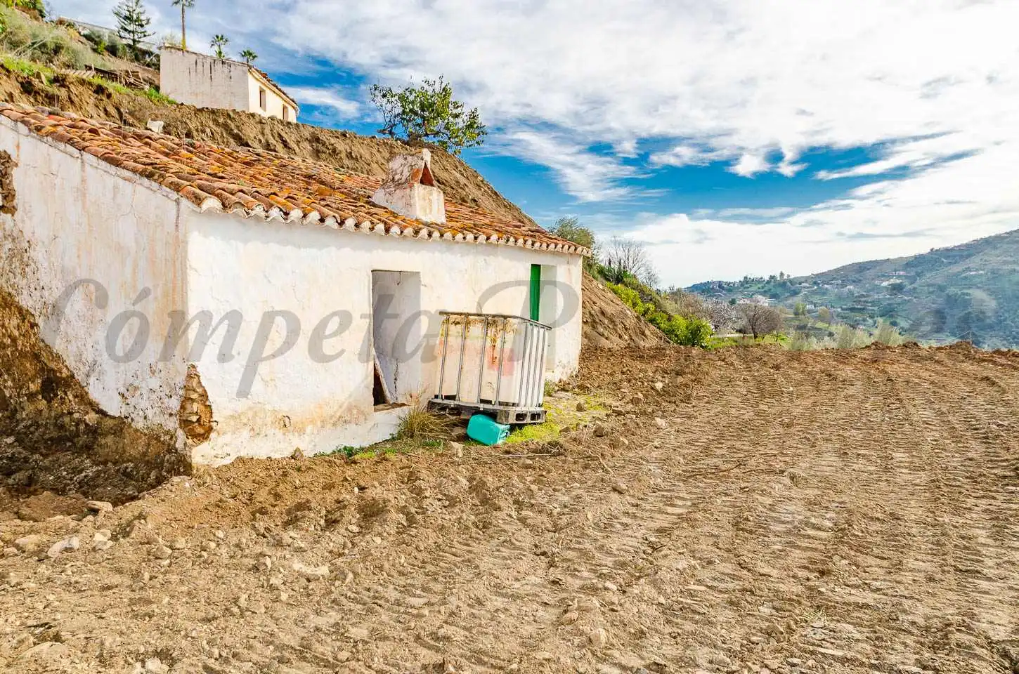 Casa rústica amb jardí en venda a Cómpeta