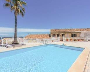 Piscina de Casa adosada en venda en Mijas amb Aire condicionat i Terrassa