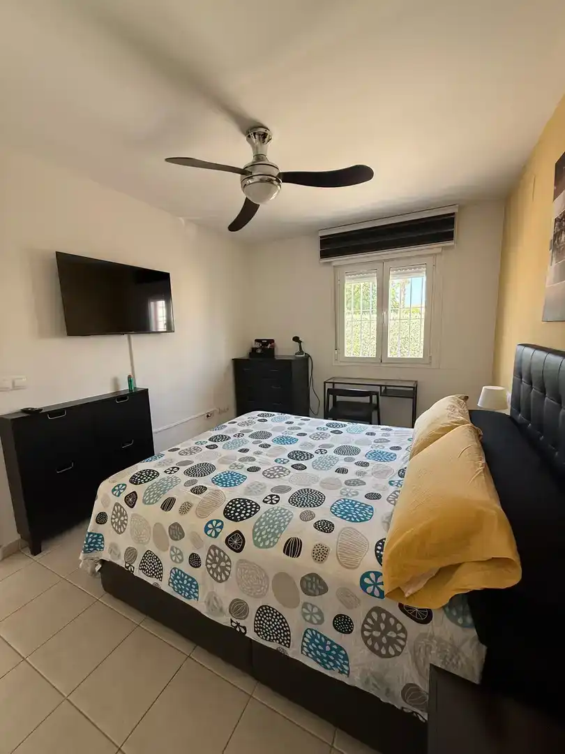 Dormitori de Apartament de lloguer en El Verger amb Aire condicionat, Jardí privat i Piscina