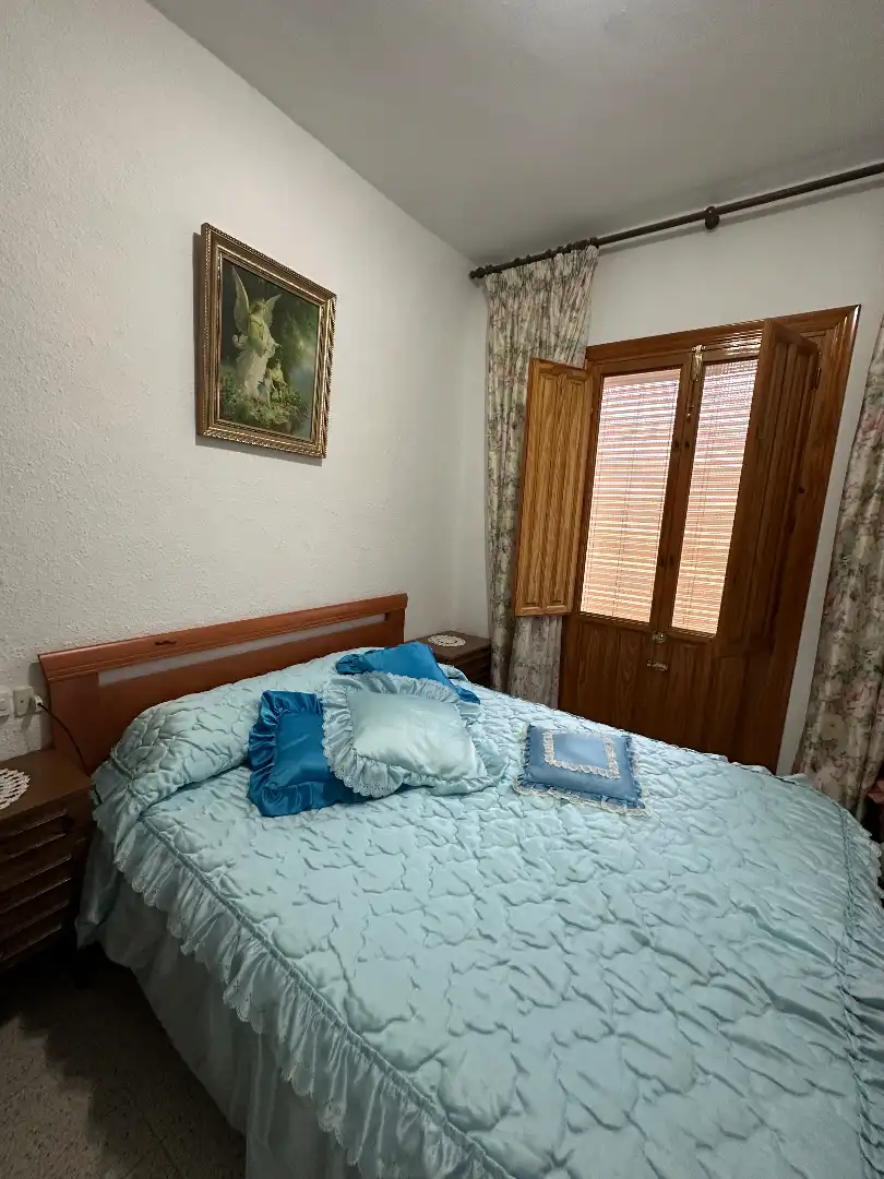 Dormitori de Casa adosada en venda en Benamargosa amb Aire condicionat, Moblat i Balcó