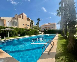 Swimming pool of Single-family semi-detached for sale in El Campello  with Air Conditioner, Terrace and Swimming Pool