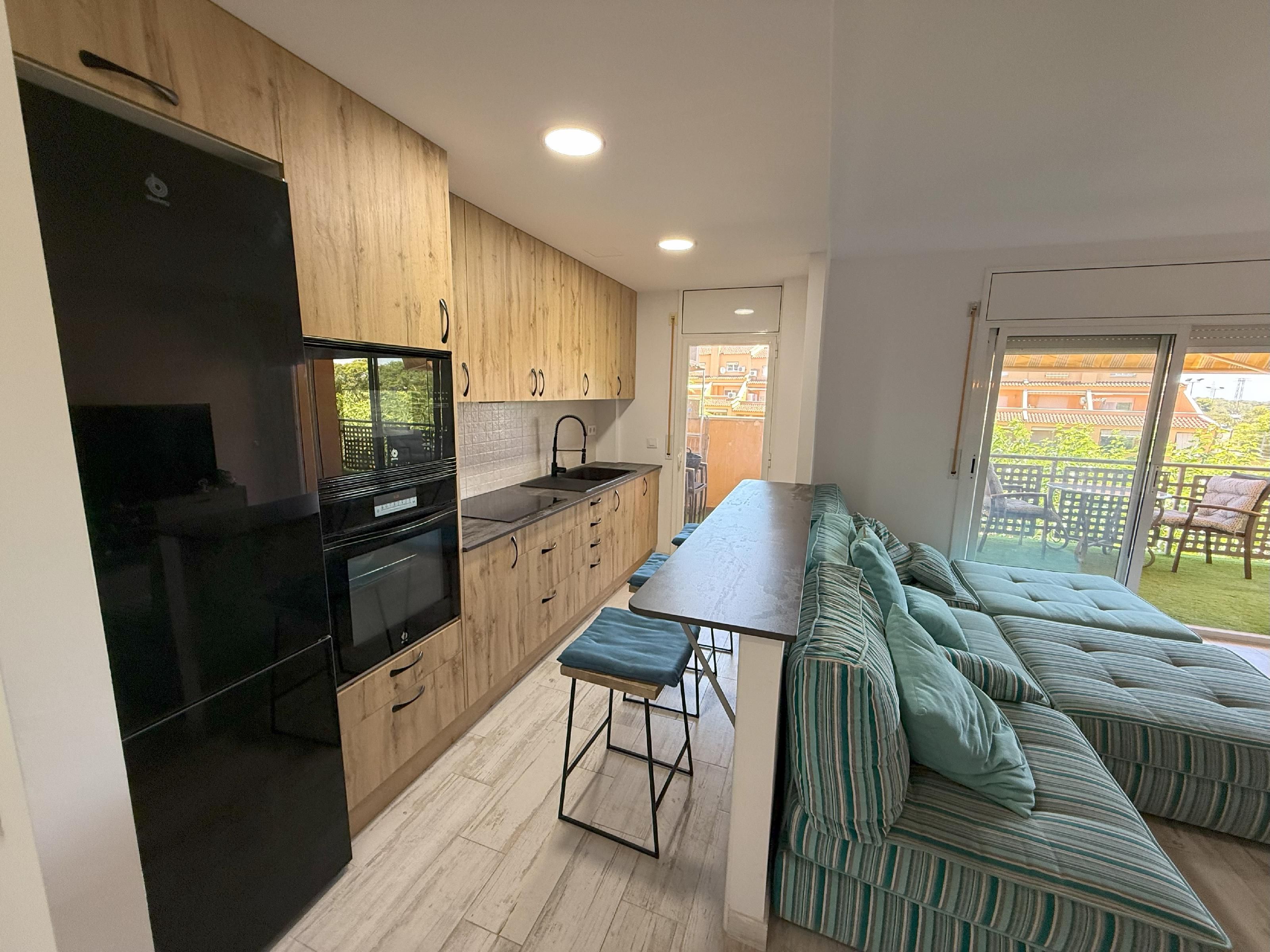 Cuina de Apartament en venda en Roda de Berà amb Jardí privat, Terrassa i Piscina