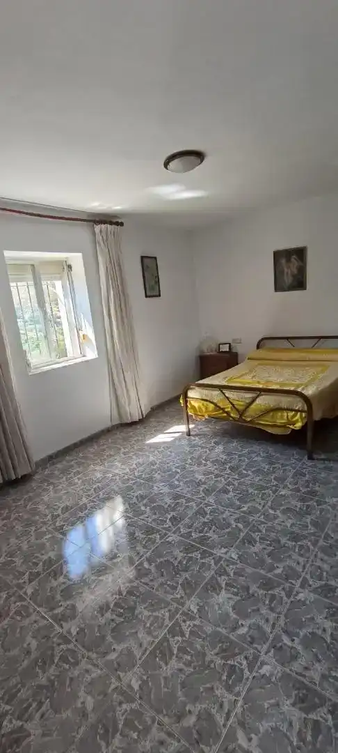 Dormitori de Finca rústica en venda en Comares amb Aire condicionat i Piscina