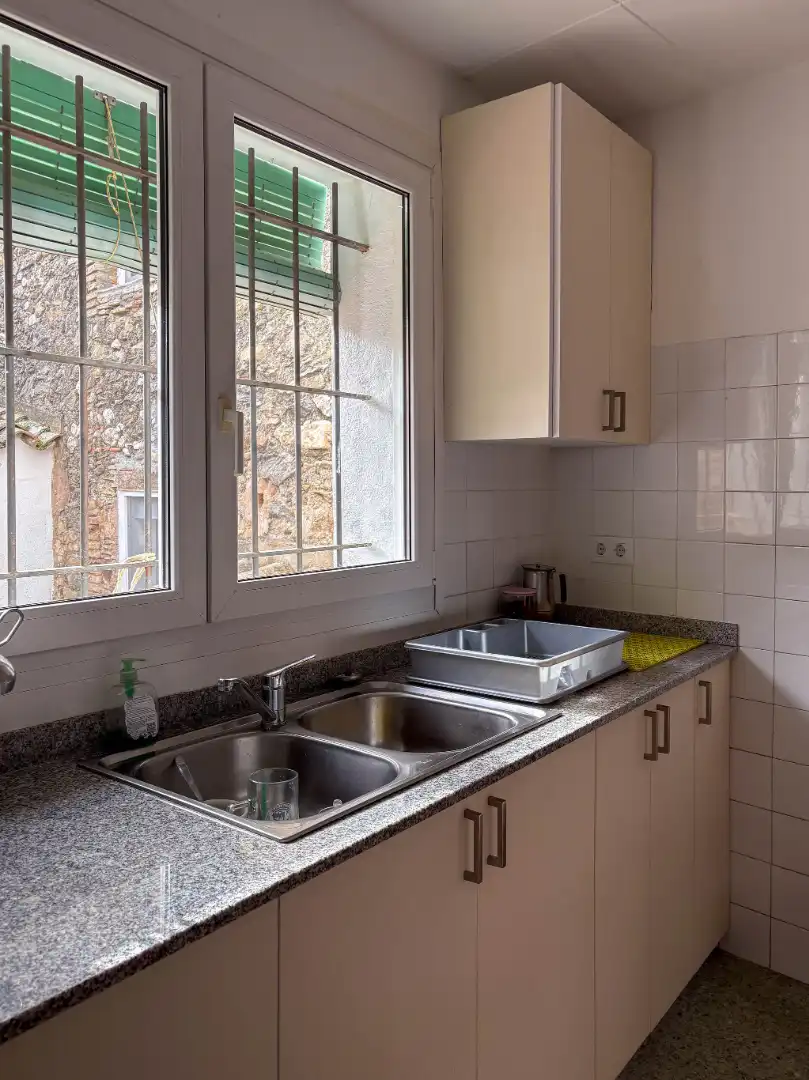 Cuina de Casa adosada en venda en Quart amb Calefacció, Terrassa i Balcó