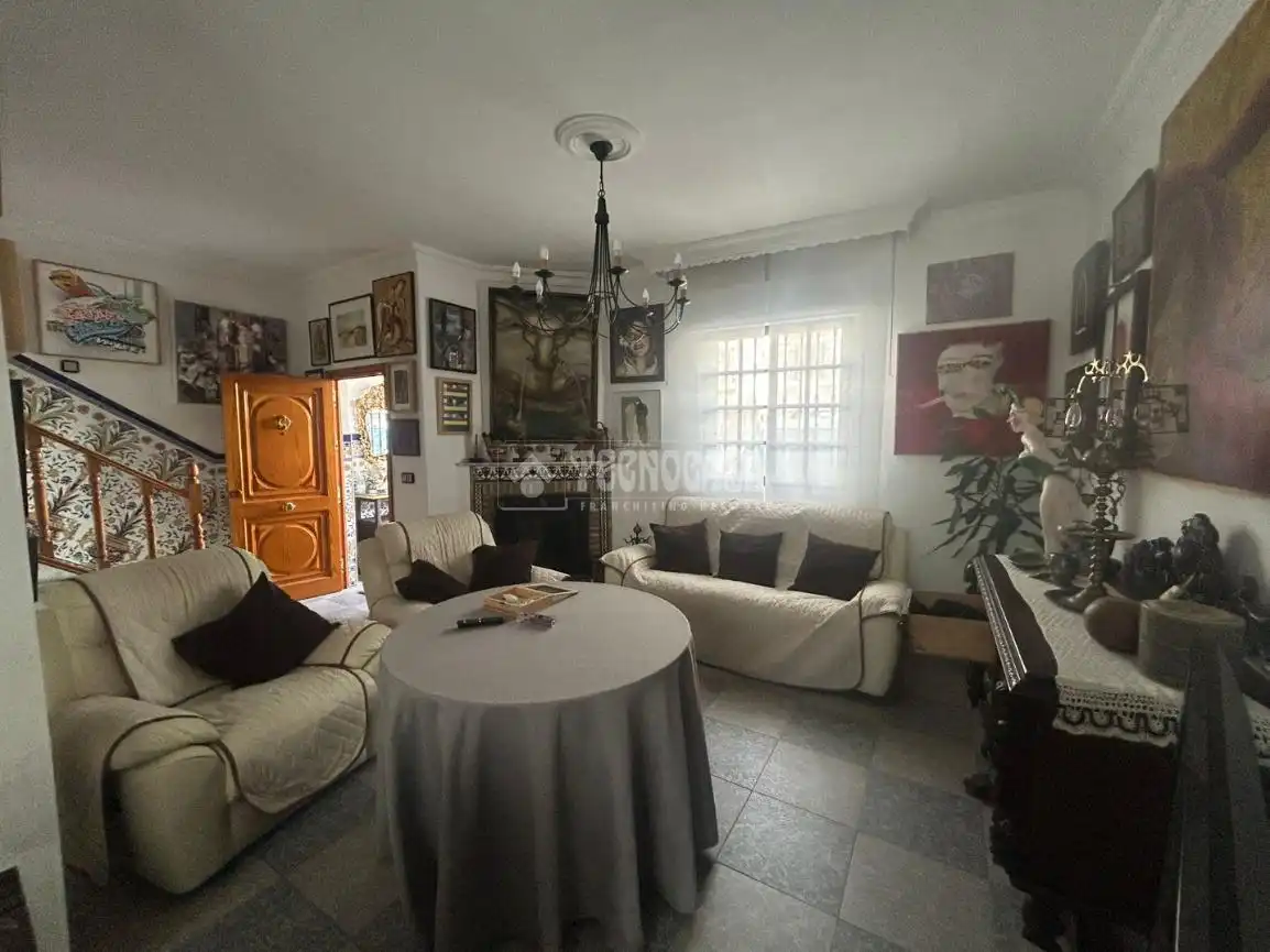 Sala de estar de Casa adosada en venta en Huelva con Aire acondicionado
