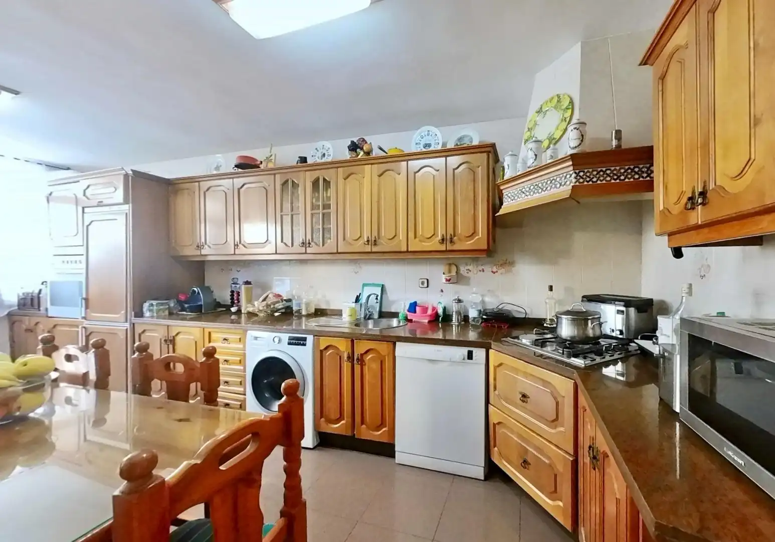Cuina de Casa adosada en venda en Málaga amb Aire condicionat, Terrassa i Piscina comunitària