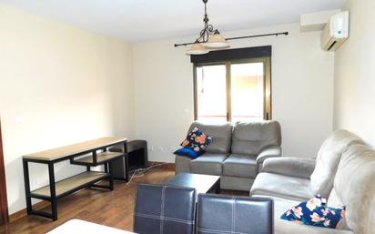 Living room of Flat for sale in Maracena  with Air Conditioner, Furnished and Oven