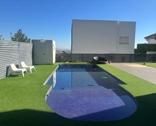 Piscina de Casa o xalet de lloguer en Chiva amb Aire condicionat, Calefacció i Jardí privat