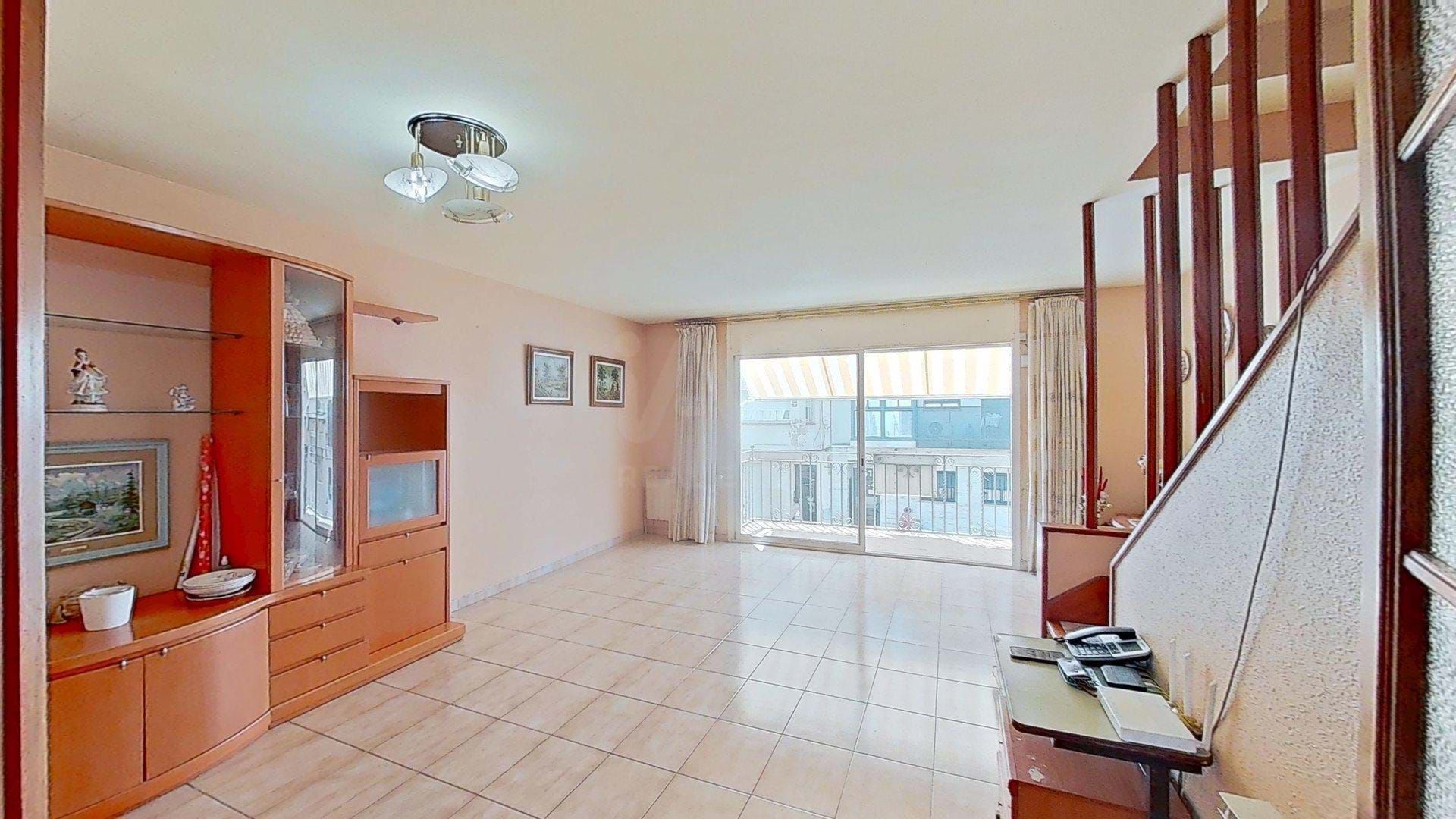 Sala d'estar de Casa adosada en venda en El Vendrell amb Terrassa